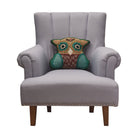 Hootie Hooked Wool Throw Pillow on an armchair, showing the throw pillow at room scale, 14x16 inch