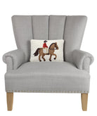 Horse Rider Hooked Wool Throw Pillow on an armchair, showing the throw pillow at room scale, 8x12 inch