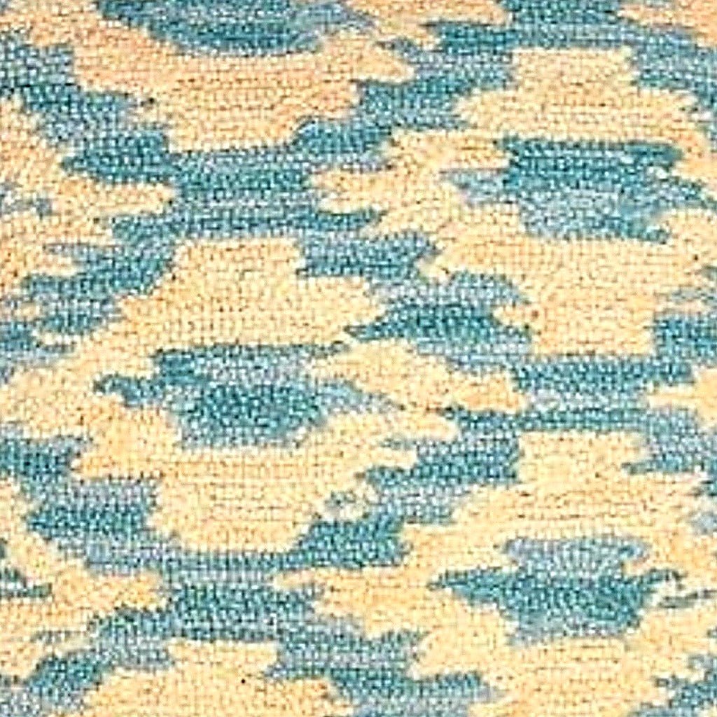 Hand-stitched wool detail of Ikat Peacock Indian Wool Hooked needlepoint pillow showing intricate weave pattern and texture