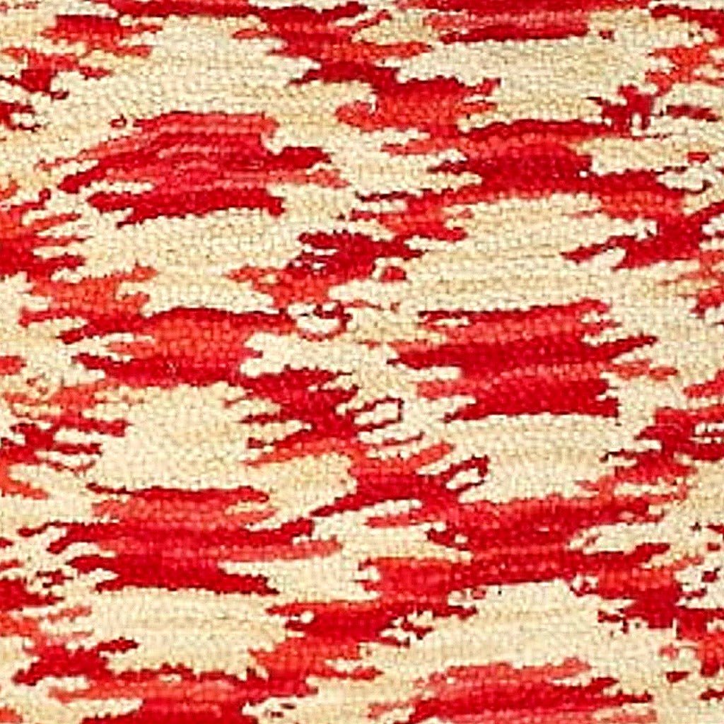 Closeup of Ikat Ruby Indian Wool Hooked needlepoint throw pillow highlighting hand-stitched wool craftsmanship and fabric detail