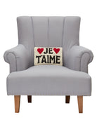 Je t'amime Hooked Wool Throw Pillow on an armchair, showing the throw pillow at room scale, 8x12 inch
