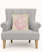 Lady Embroidered Throw Pillow on an armchair, showing the throw pillow at room scale, 14x14 inch