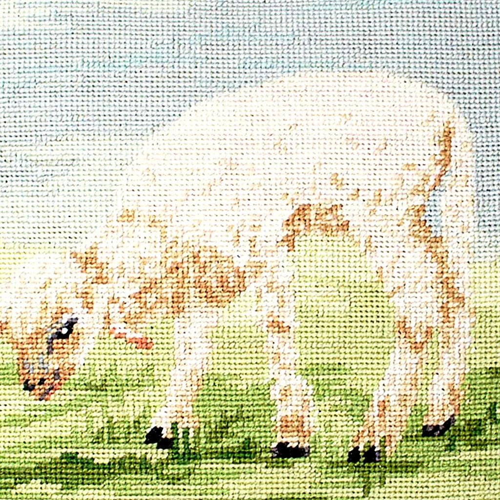Lamb Sheep Farm pillow fabric closeup showing hand-embroidered needlepoint wool texture and color detail