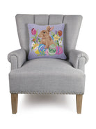 Lavender Bunny with Eggs Hooked Wool Easter Throw Pillow on an armchair, showing the throw pillow at room scale, 16x16 inch