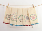 Leave by 9 with Pom Poms Kitchen Towel shown alongside other designs in the same collection, 15x22 inch