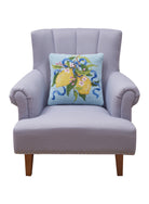Lemons Hooked Wool Throw Pillow on an armchair, showing the throw pillow at room scale, 16x16 inch