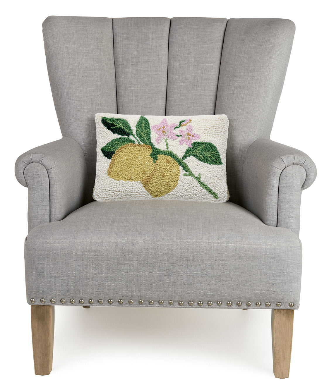 Lemons on a Branch Hooked Wool Throw Pillow on an armchair, showing the throw pillow at room scale, 8x12 inch