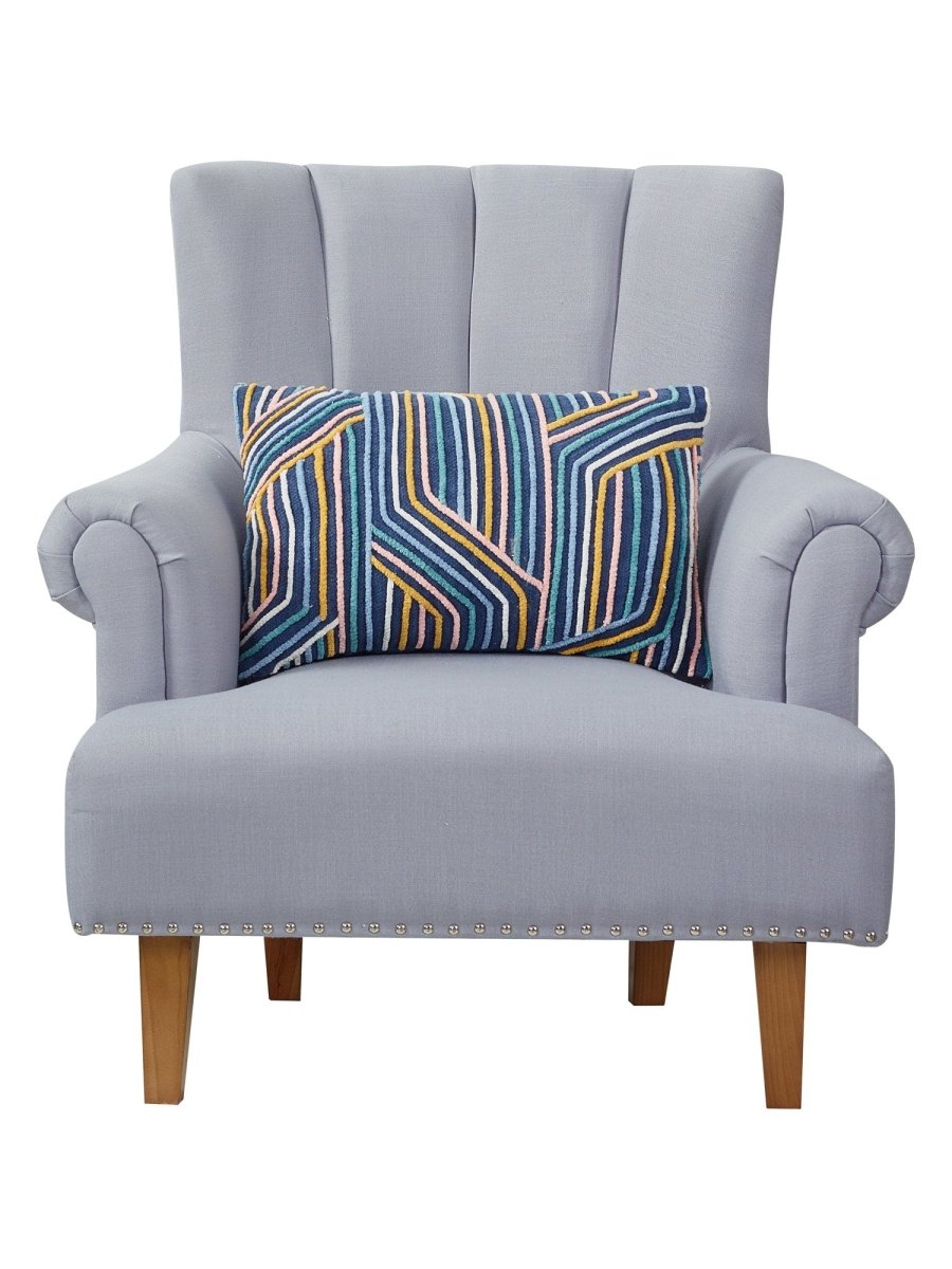 Linework Embroidered Throw Pillow on an armchair, showing the throw pillow at room scale, 14x20 inch