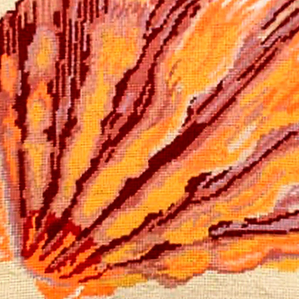 Closeup of Lions Paw Sea Shell Coastal needlepoint throw pillow highlighting hand-stitched wool craftsmanship and fabric detail