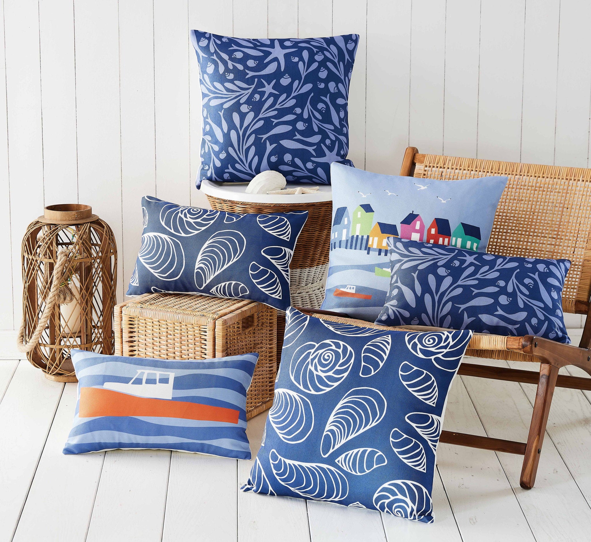 Lobster Cove House Printed Throw Pillow shown alongside other designs in the same collection, 20x20 inch