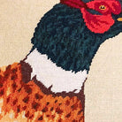 Closeup of Lodge Style Rustic Pheasant Wildlife needlepoint throw pillow highlighting hand-stitched wool craftsmanship and fabric detail