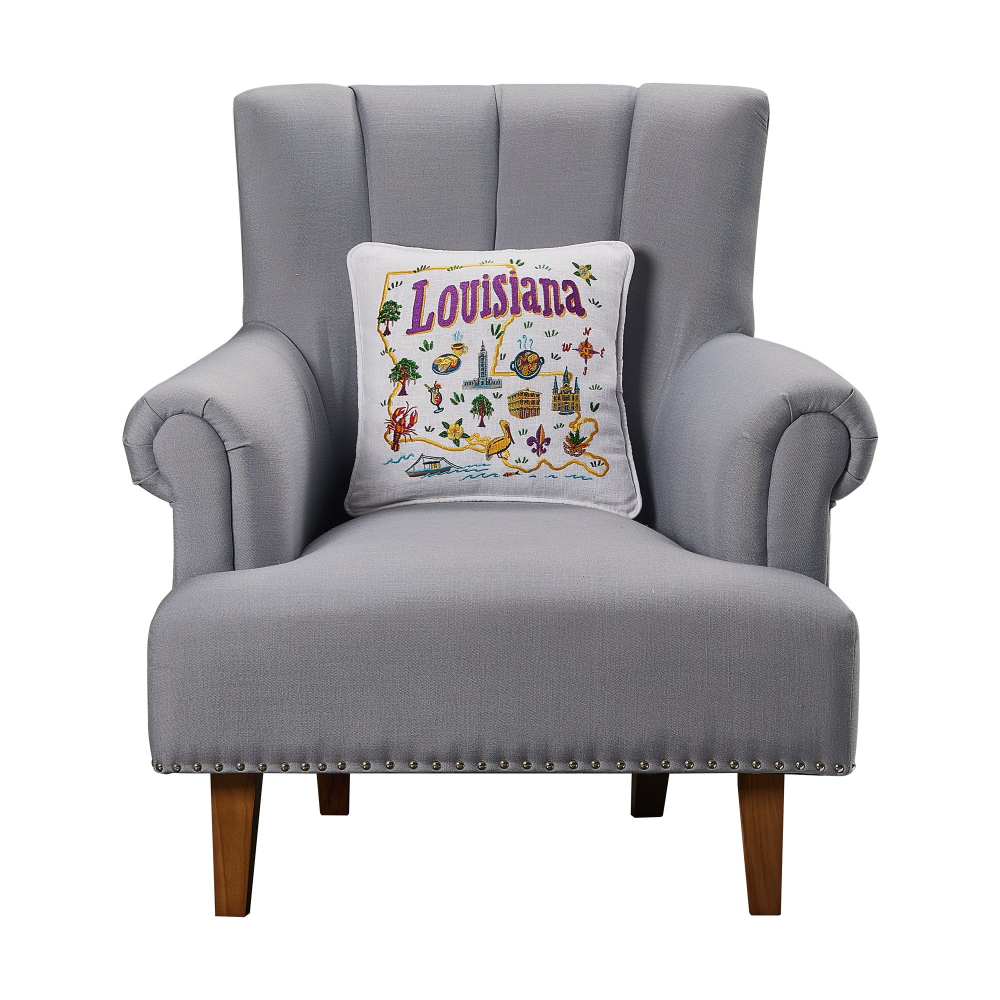 Louisiana Embroidered Throw Pillow on an armchair, showing the throw pillow at room scale, 14x14 inch