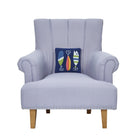 Lures Hooked Wool Throw Pillow on an armchair, showing the throw pillow at room scale, 10x10 inch