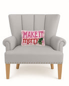Make It Merry Hooked Wool Christmas Throw Pillow on an armchair, showing the throw pillow at room scale, 9x16 inch