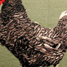 Closeup of Maran Chicken Black White needlepoint throw pillow highlighting hand-stitched wool craftsmanship and fabric detail