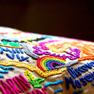 Marin County Nature Embroidered Travel Throw Pillow - close-up detail of hand-embroidered needlepoint stitching