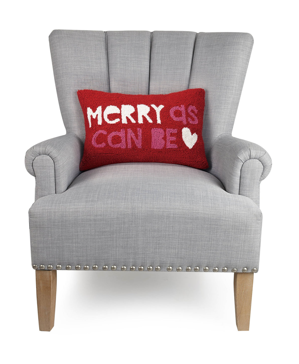 Merry as Can Be Hooked Wool Christmas Throw Pillow on an armchair, showing the throw pillow at room scale, 12x18 inch