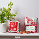 Merry & Bright Embroidered Needlepoint Christmas Throw Pillow shown alongside other designs in the same collection, 8x12 inch