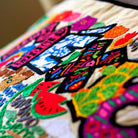 Mexico City Culture Embroidered Travel Throw Pillow - close-up detail of hand-embroidered needlepoint stitching