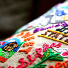Minnesota State North Star Travel Embroidered Throw Pillow - close-up detail of hand-embroidered needlepoint stitching