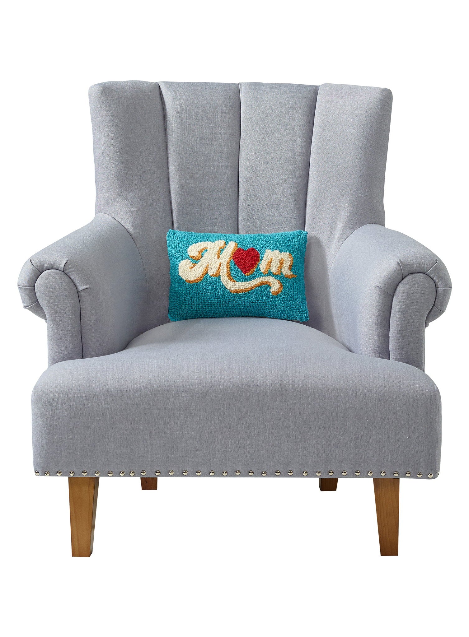 Mom Heart Hooked Wool Throw Pillow on an armchair, showing the throw pillow at room scale, 8x12 inch