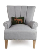 Moose Hooked Wool Throw Pillow on an armchair, showing the throw pillow at room scale, 8x12 inch