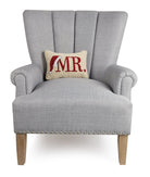 Mr Hooked Wool Christmas Throw Pillow on an armchair, showing the throw pillow at room scale, 8x12 inch