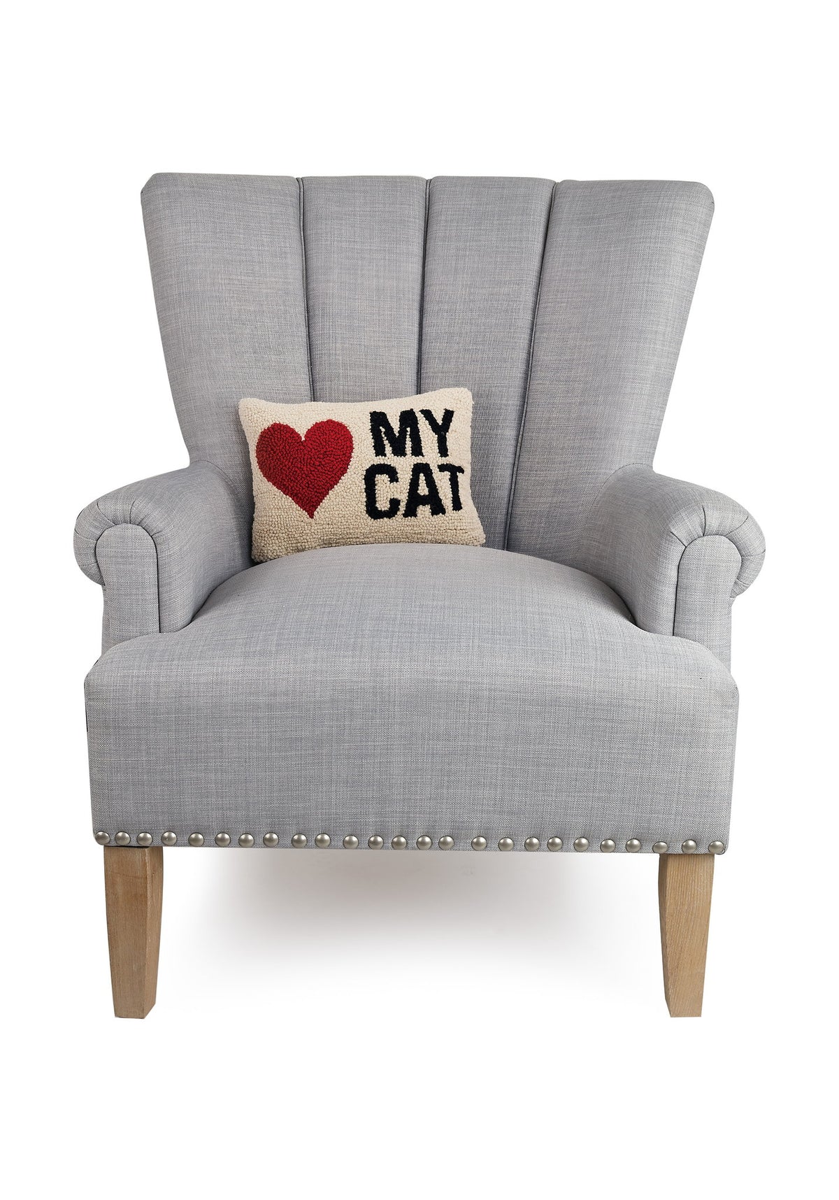 My Heart Cat Hooked Wool Throw Pillow on an armchair, showing the throw pillow at room scale, 8x12 inch