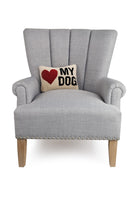 My Heart Dog Hooked Wool Throw Pillow on an armchair, showing the throw pillow at room scale, 8x12 inch