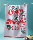 Naughty List with Pom Poms Christmas Kitchen Towel styled in a room setting, 18x25 inch