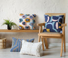 Navy & Bright Shapes Embroidered Throw Pillow shown alongside other designs in the same collection, 18x18 inch
