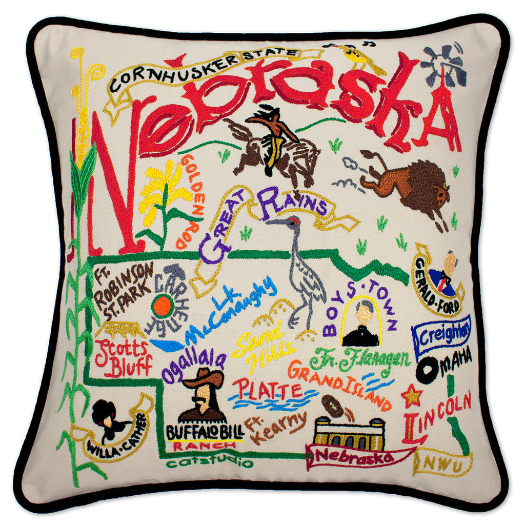 University of Nebraska Cornhuskers embroidered throw pillow with school mascot.