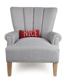Nice Hooked Wool Christmas Throw Pillow on an armchair, showing the throw pillow at room scale, 12x5 inch