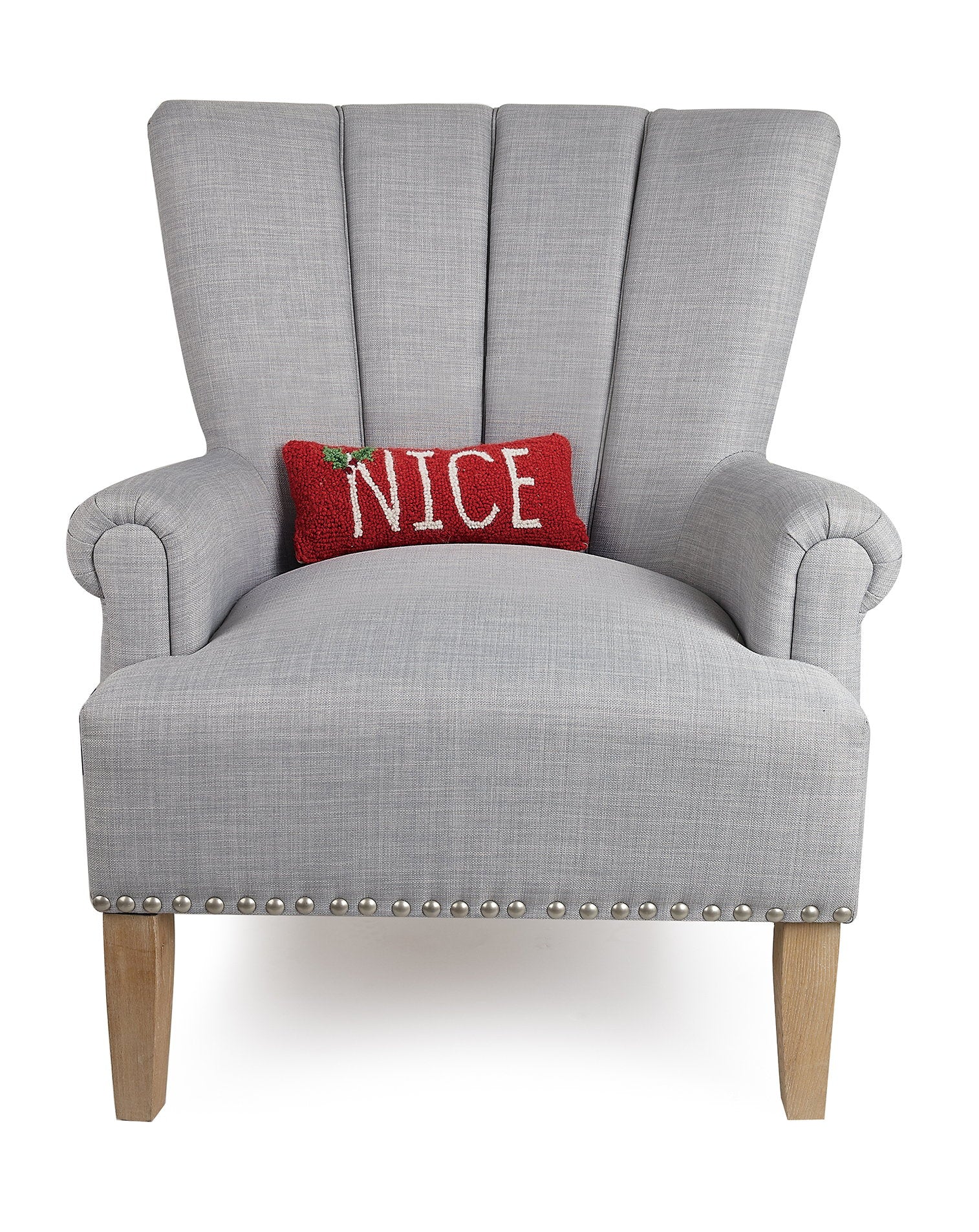 Nice Hooked Wool Christmas Throw Pillow on an armchair, showing the throw pillow at room scale, 12x5 inch