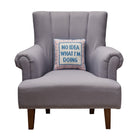 No Idea What I'm Doing Embroidered Needlepoint Throw Pillow, 12x12 inch, centered on a gray upholstered armchair