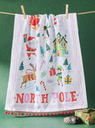 North Pole with Pom Poms Christmas Kitchen Towel styled in a room setting, 18x25 inch