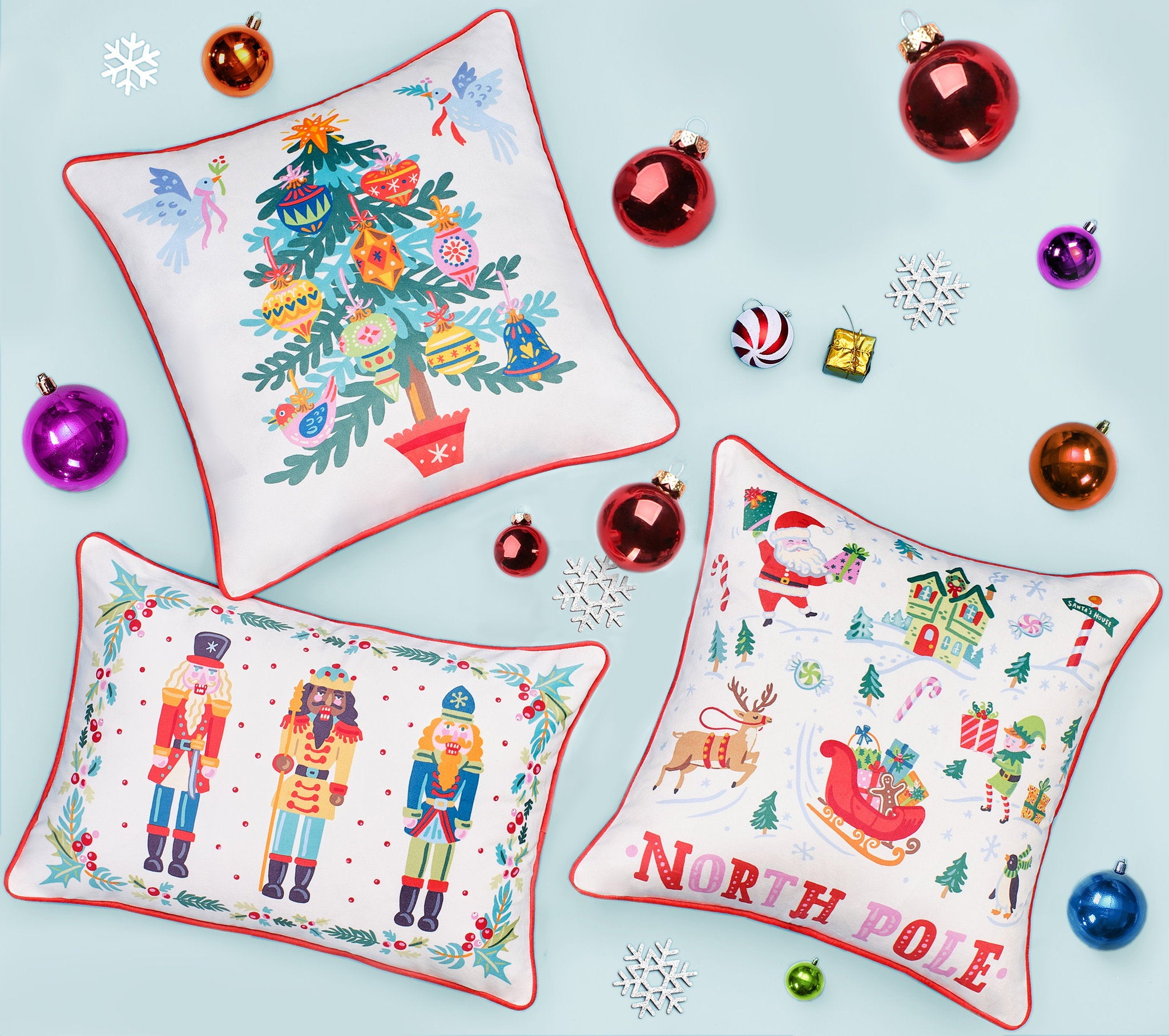 Nutcrackers Printed Christmas Throw Pillow shown alongside other designs in the same collection, 14x20 inch
