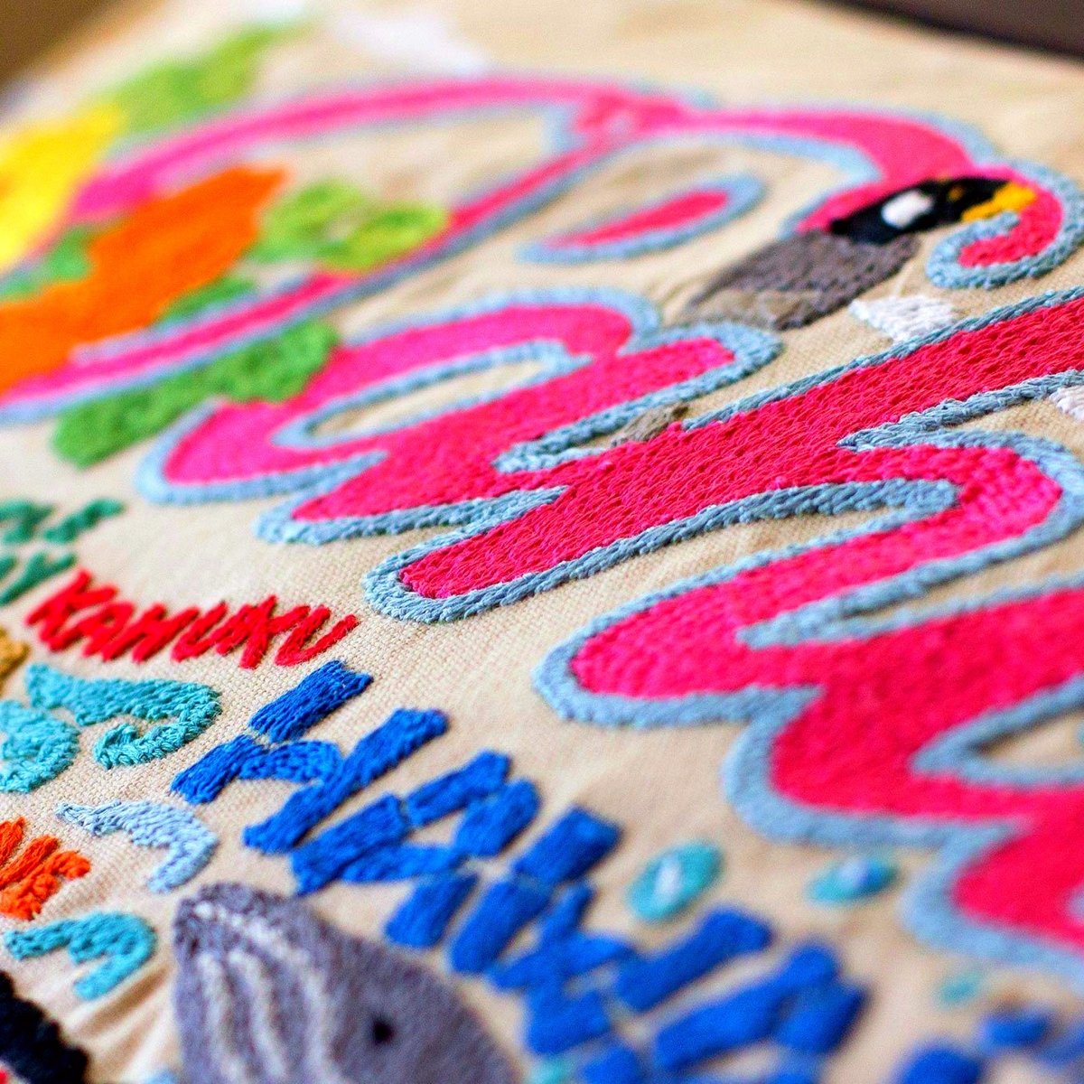Oahu Hawaiian Island Embroidered Travel Throw Pillow - close-up detail of hand-embroidered needlepoint stitching