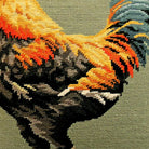 Old English Game Rooster pillow fabric closeup showing hand-embroidered needlepoint wool texture and color detail