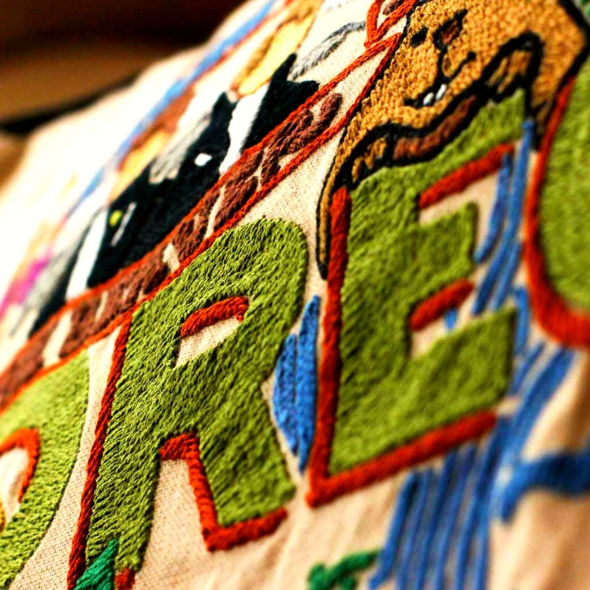 Oregon State Beaver Travel Embroidered Throw Pillow - close-up detail of hand-embroidered needlepoint stitching