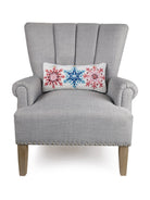 Ornaments Hooked Wool Christmas Throw Pillow on an armchair, showing the throw pillow at room scale, 9x18 inch