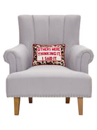 Others Were Thinking It Embroidered Needlepoint Throw Pillow on an armchair, showing the throw pillow at room scale, 10x14 inch