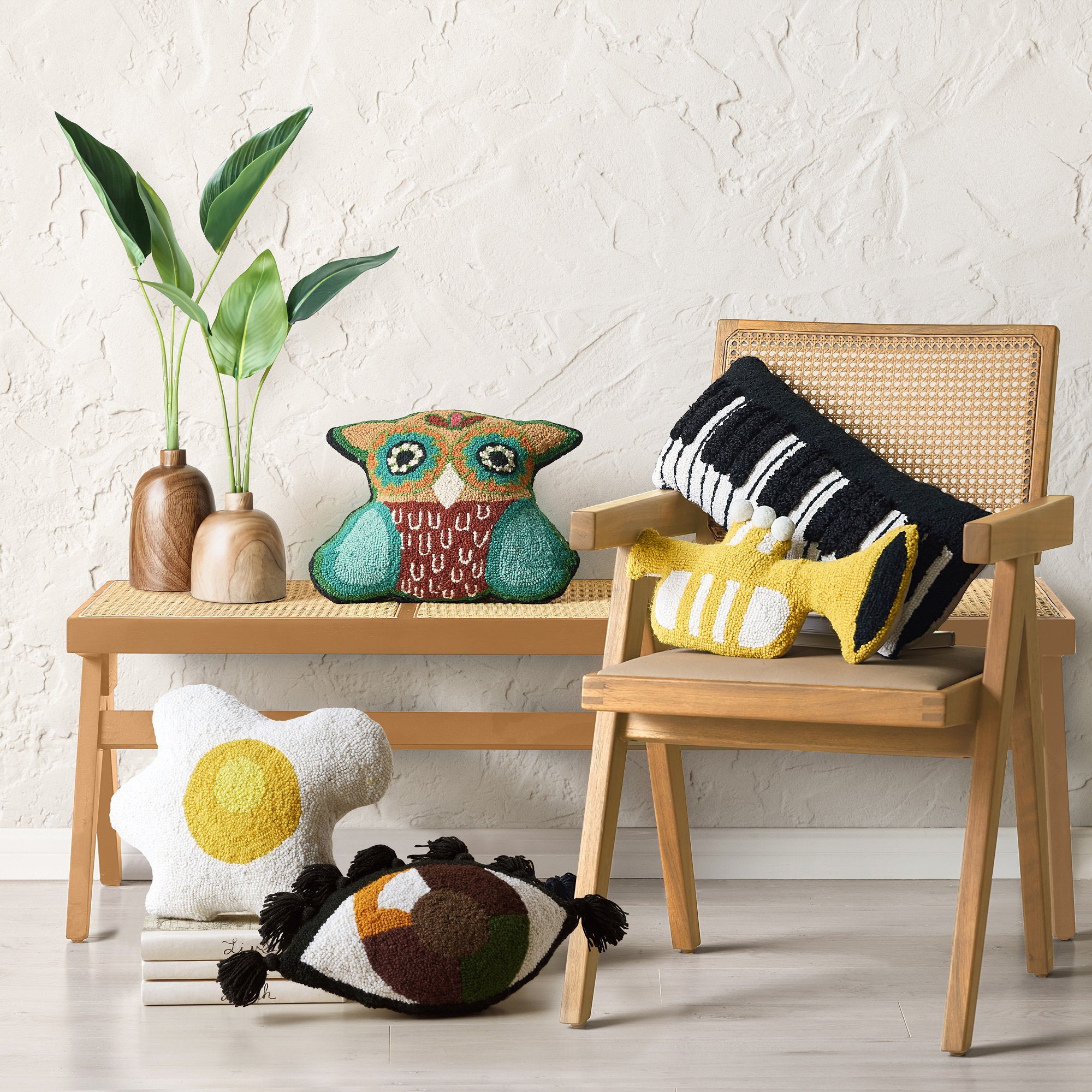 Over Easy Hooked Wool Throw Pillow shown alongside other designs in the same collection, 14x14 inch