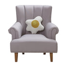 Over Easy Hooked Wool Throw Pillow on an armchair, showing the throw pillow at room scale, 14x14 inch