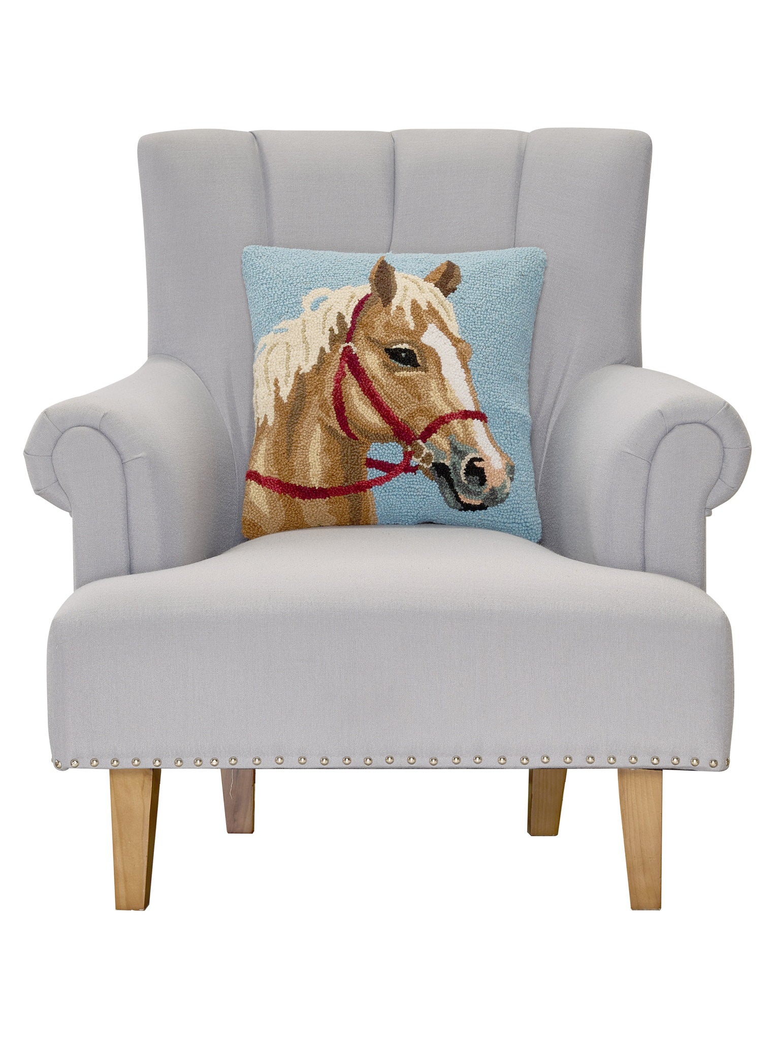 Palomino Horse Hooked Wool Throw Pillow on an armchair, showing the throw pillow at room scale, 16x16 inch