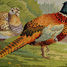 Closeup of Pheasants In The Field needlepoint throw pillow highlighting hand-stitched wool craftsmanship and fabric detail