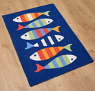 Picket Fish Hooked Wool Rug styled in a room setting, 34x47 inch