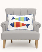 Picket Fish Oblong Printed Throw Pillow on an armchair, showing the throw pillow at room scale, 12x20 inch