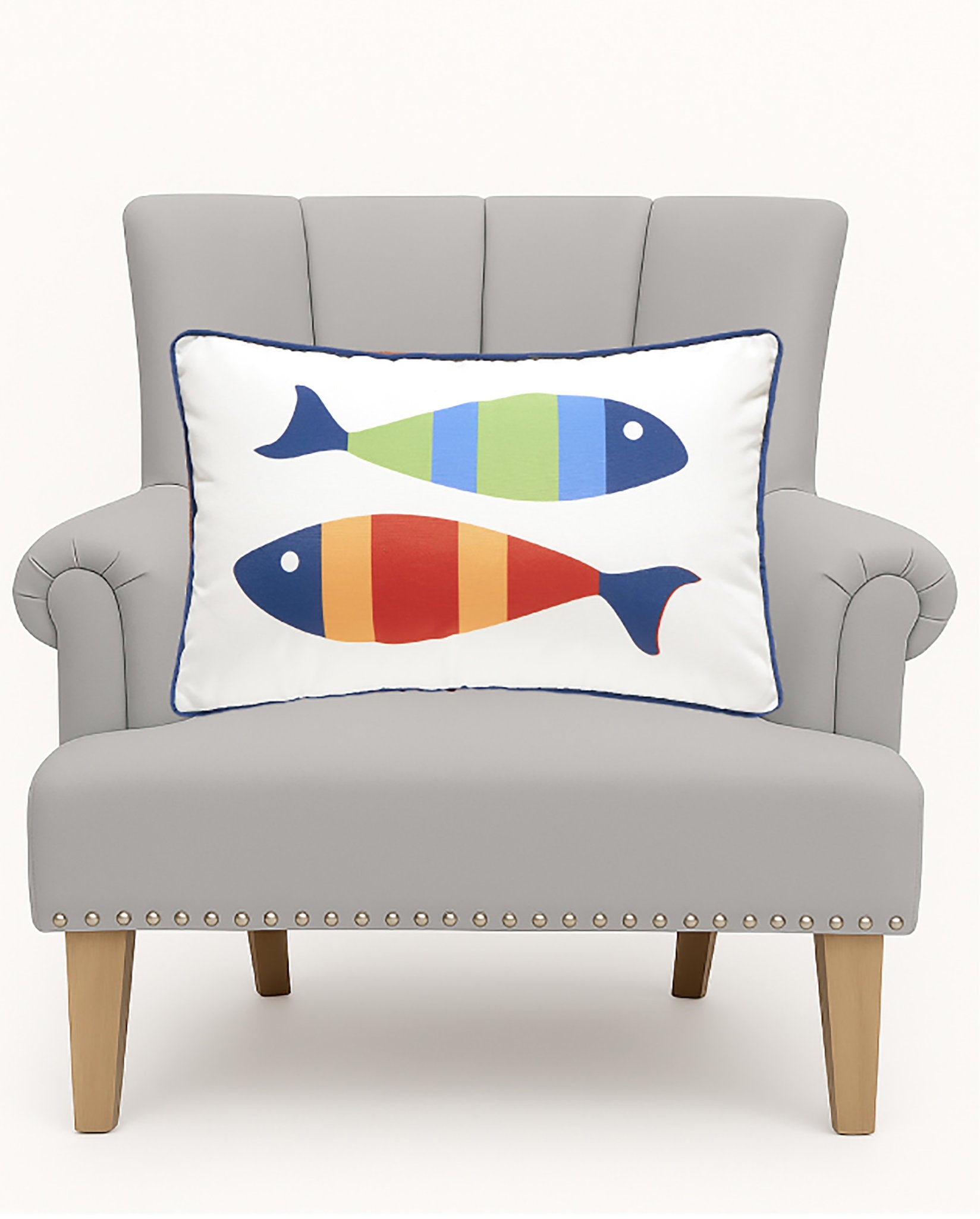 Picket Fish Oblong Printed Throw Pillow on an armchair, showing the throw pillow at room scale, 12x20 inch