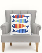 Picket Fish Square Printed Throw Pillow on an armchair, showing the throw pillow at room scale, 20x20 inch